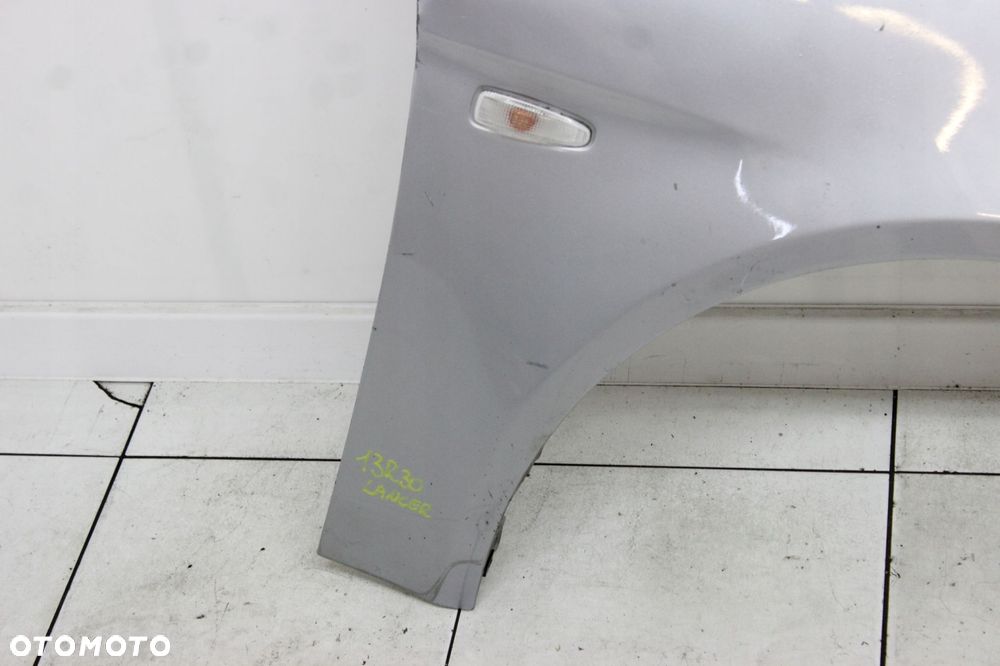 MITSUBISHI LANCER VIII 07R- BŁOTNIK PRAWY PRZÓD PRZEDNI A31B - 2