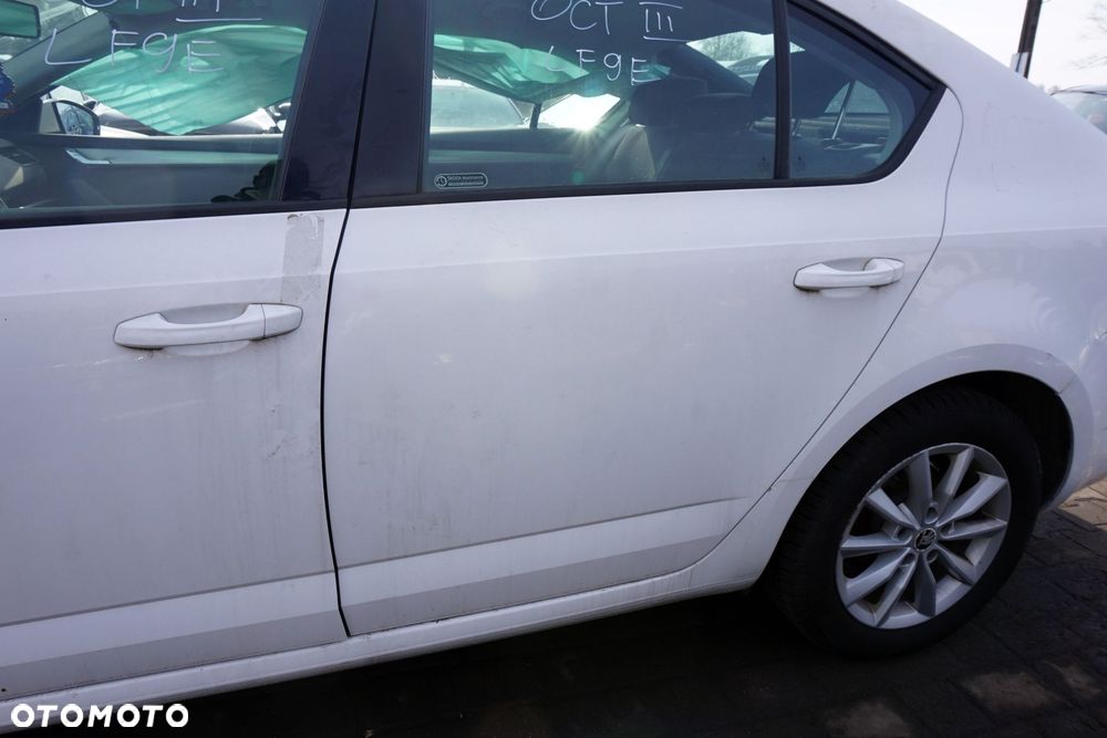 DRZWI TYLNE LEWE OCTAVIA III 5E3 LB LIFTBACK LF9E  BIAŁY SKODA 2012-2016 - 2