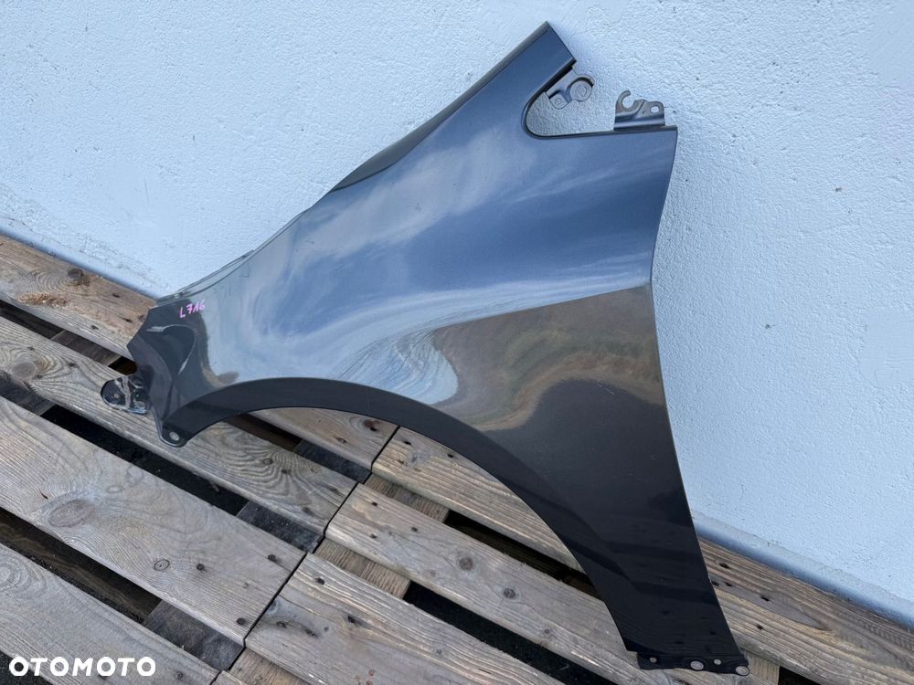 blotnik przod przedni lewy toyota corolla e21 hb kombi 2018- caly oryginal - 2