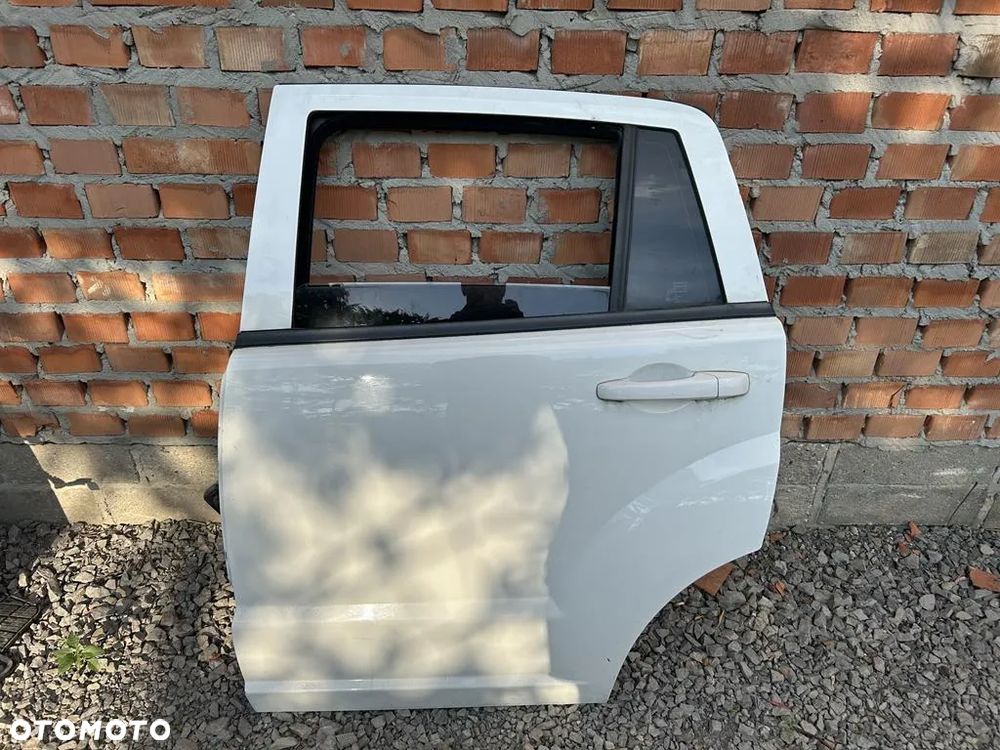 Drzwi lewe tył tylne DODGE CALIBER bez malowania - 1