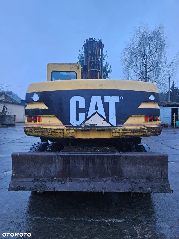 Caterpillar M315 - 4