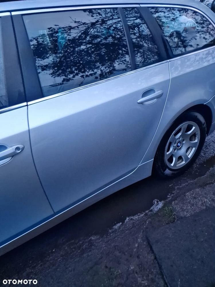Drzwi  lewy  tył  BMW  E61 w kolorze  354 - 3