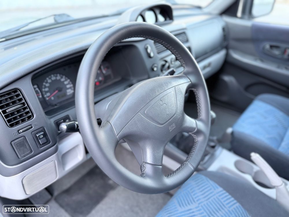 Mitsubishi Pajero Sport 2.5 TD GLS - 16