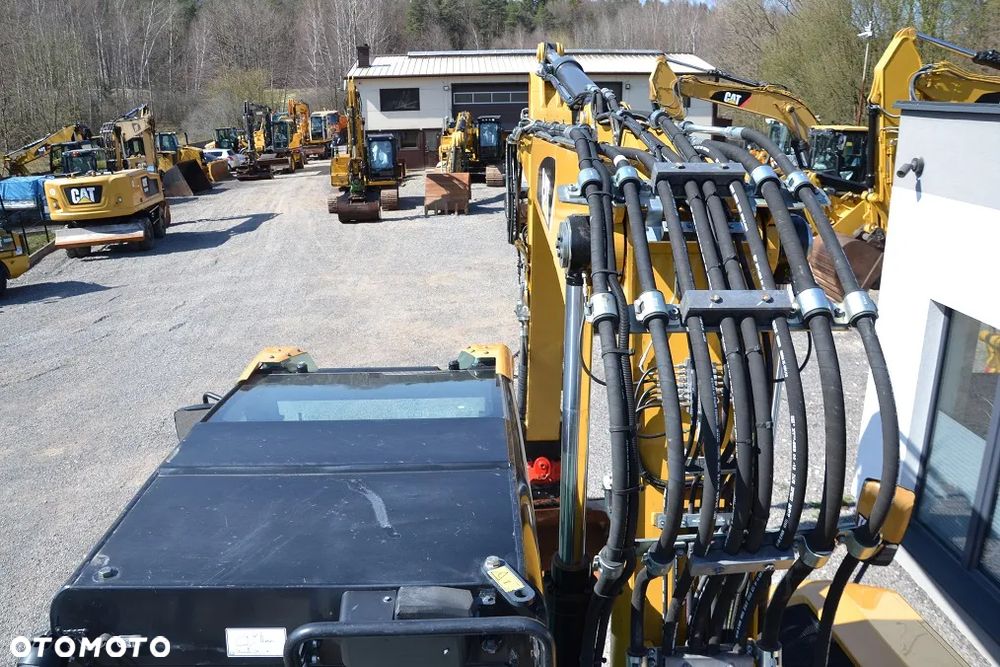 Caterpillar M 315 F, ROTOTILT R5 - 23