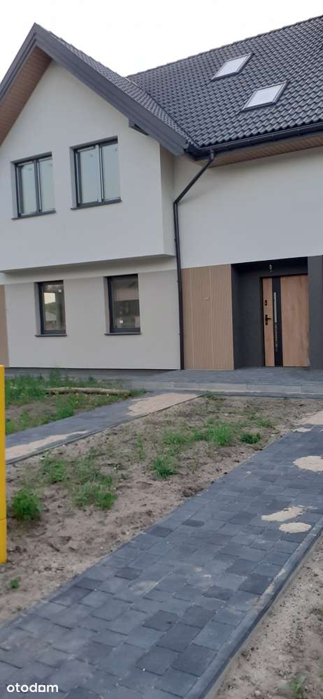 Mieszkanie w zabudowie szeregowej z ogródkiem