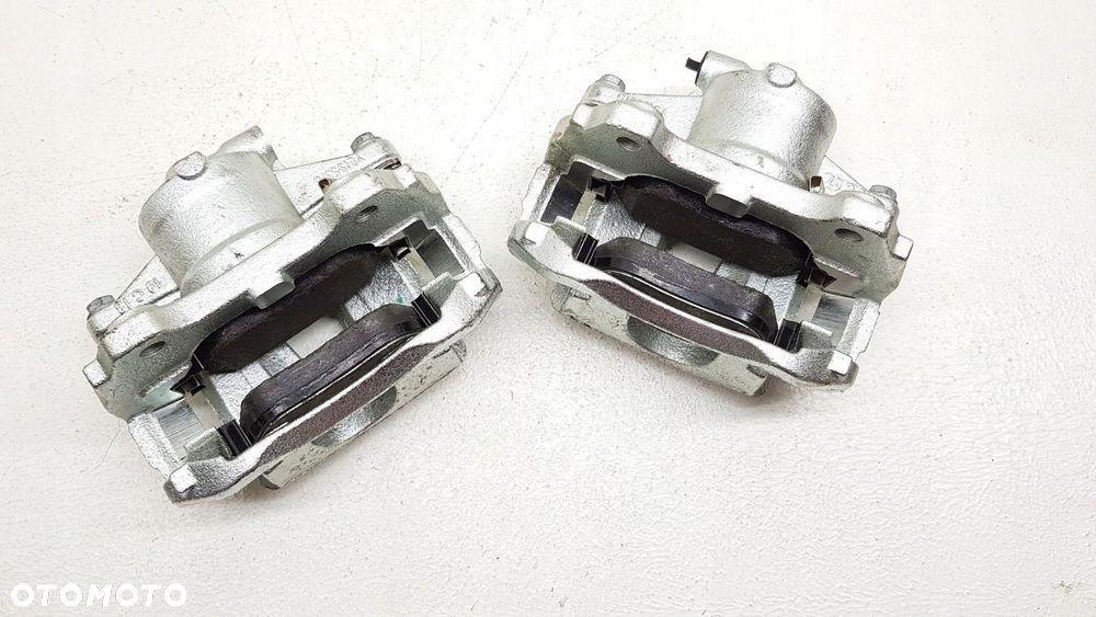 Zacisk jarzmo przód Opel Corsa D - 2