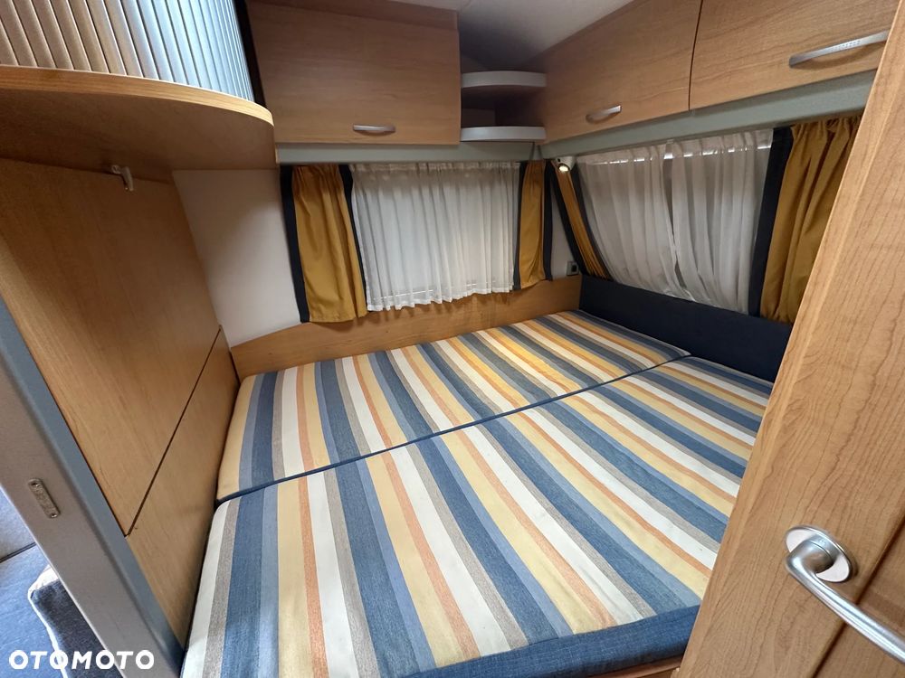 KNAUS 500 SUDWIND z przedsionkiem, napędem i łóżkami piętrowymi. - 32