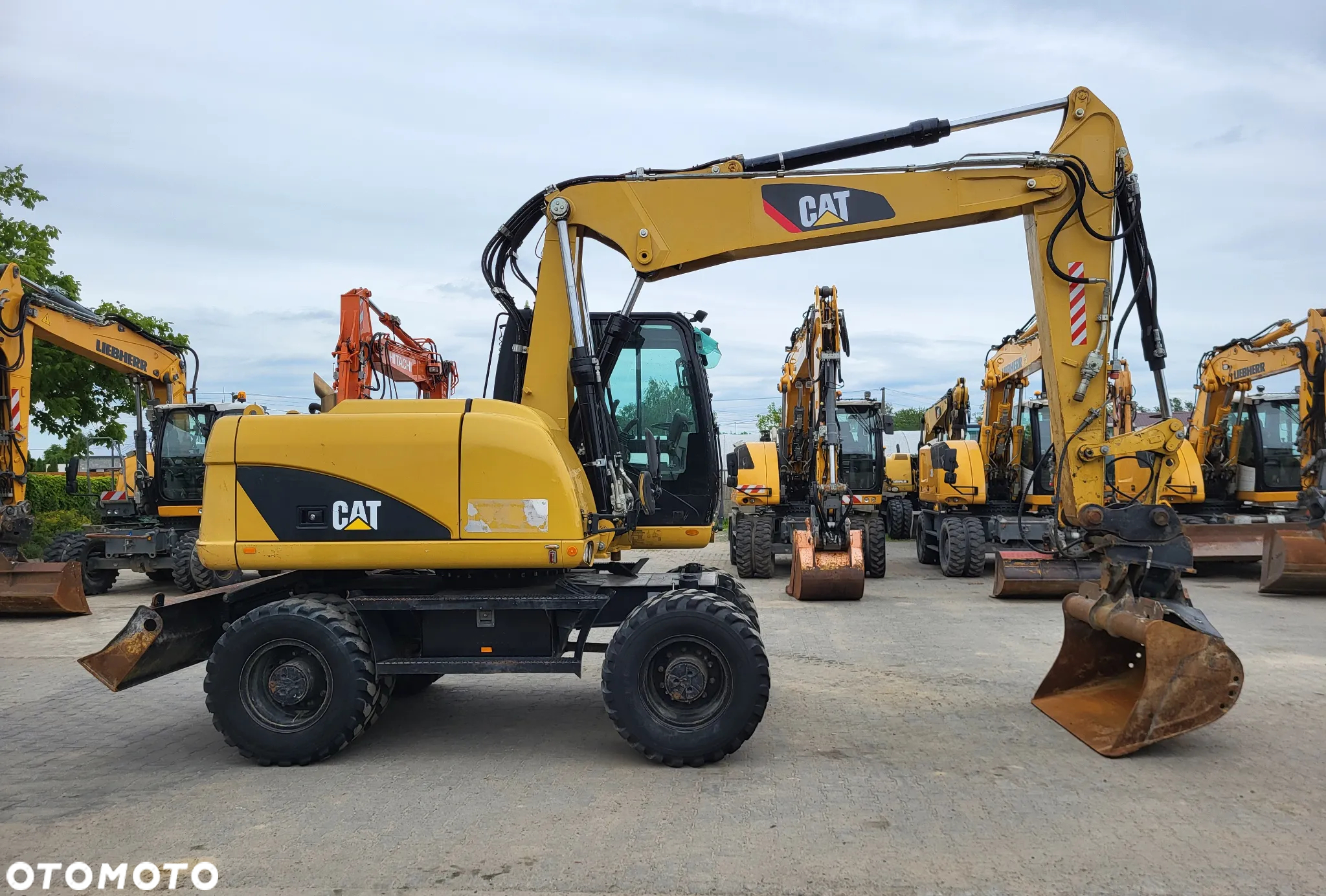 Caterpillar M 313D / z Niemiec / Stan idealny / - 5