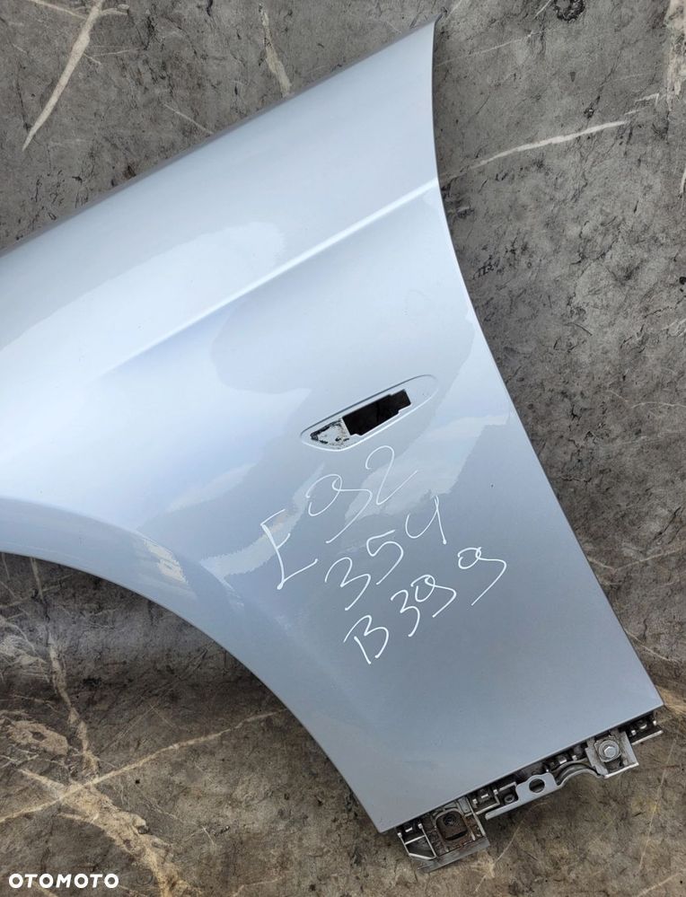 BŁOTNIK LEWY PRZÓD PRZEDNI BMW E92 E93 354 TTIANSILBER B399 - 2