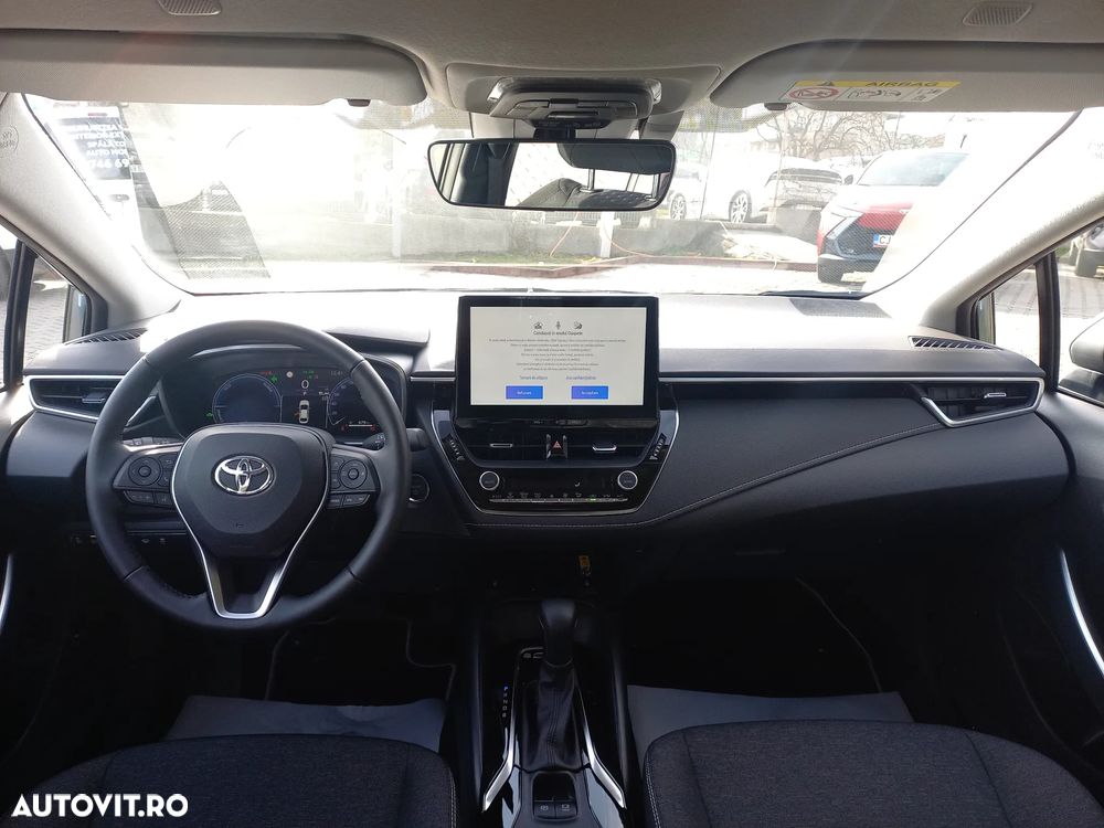 Toyota Corolla Sedan 1.8 HSD Business - 14