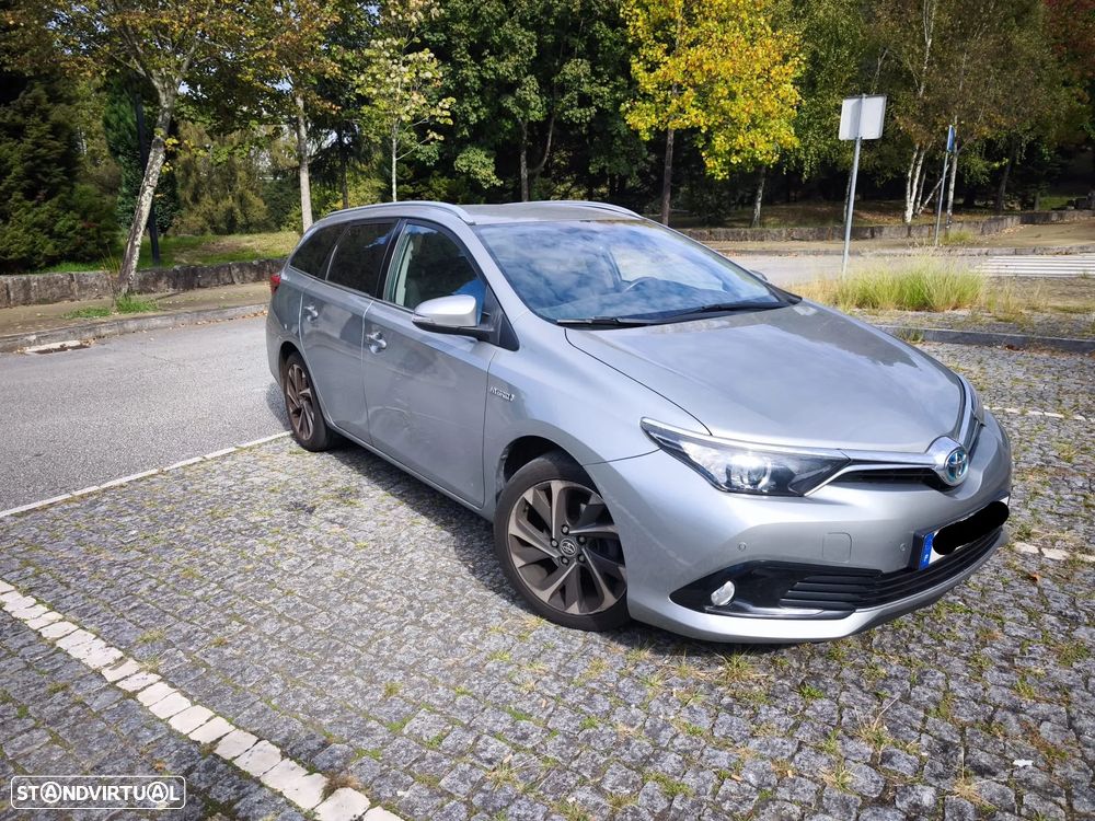 Toyota Auris Touring Sports 1.8 HSD Comfort+P.Sport - 9