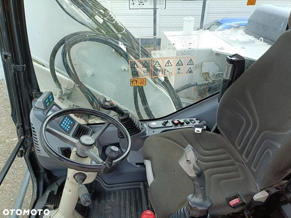 Komatsu PW 140 - 10