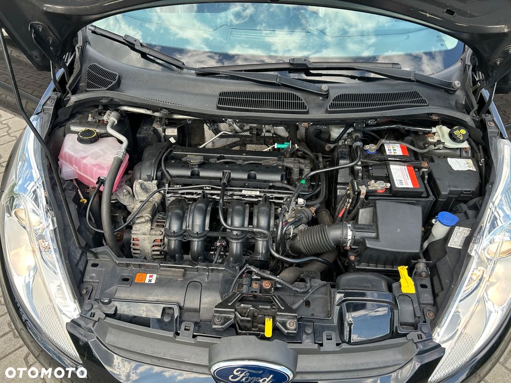 Ford Fiesta 1.4 Ghia - 27