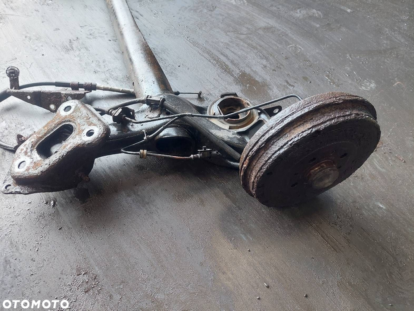 BELKA OŚ ZAWIESZENIA TYŁ BĘBNY Z ABS OPEL CORSA D - 3