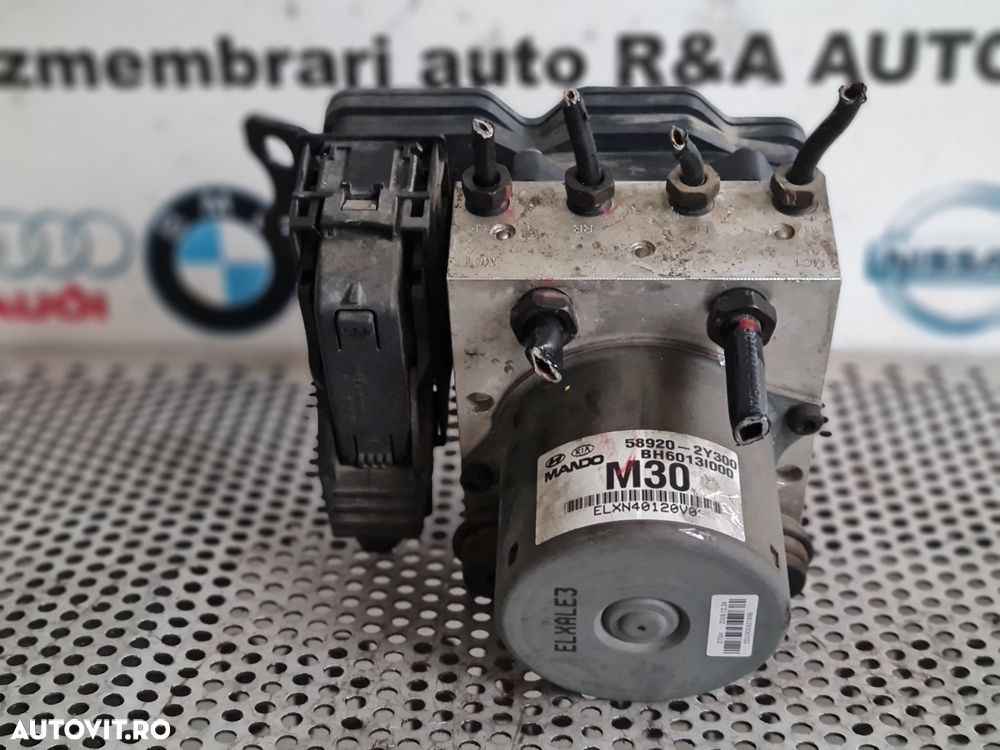 Modul Pompa Unitate ABS Hyundai IX35 Volan Stanga An 2009-2010-2011-2012-2013-2014-2015 Cod 58920-2Y300 Dezmembrez Hyundai IX35 2.0 Benzina 2x4 Cod Motor G4KD An 2009-2010-2011-2012-2013-2014-2015 Volan Stanga - 4