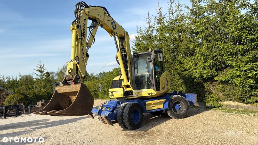 Mecalac Koparka 14 ton MECALAC 15 MWR koparko-ładowarka 3 łyżki widły 1 wł Centr.smarowanie Opony na BLIŹNIAKU 80%Camso ładowarka 714 12MTX 4x4 skrętne KLIMA kabina Premium silnik 146KM volvo EW140B DEUTZ szybka 35km/h - 18