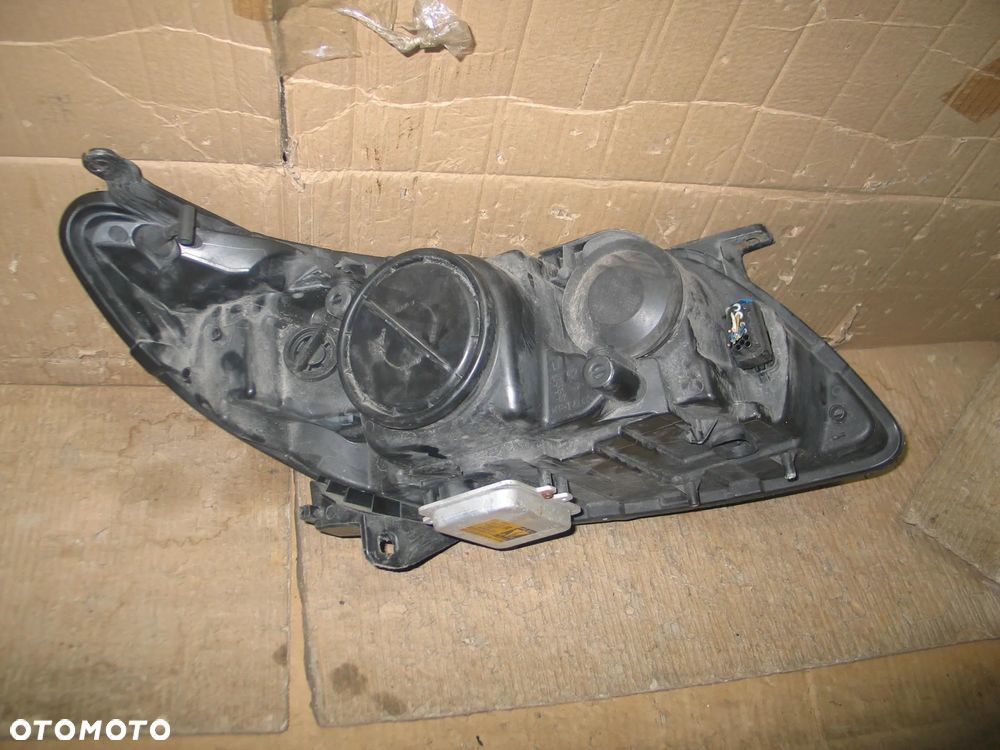 lampa xenon przod saab 93 9-3 2 II lift 07-14r. oryginal europa - 11