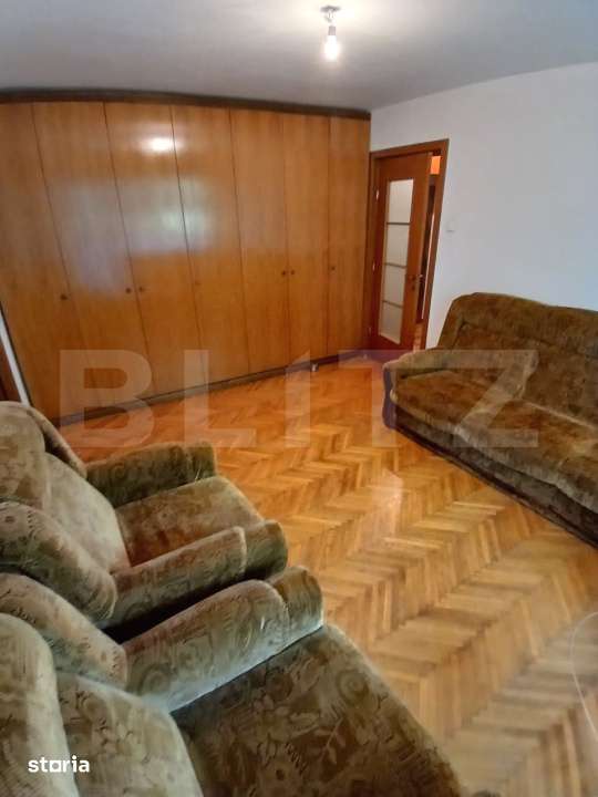 Apartament cu 2 camere de 50mp, semidecomandat, in zona linistita — fotografia 1
