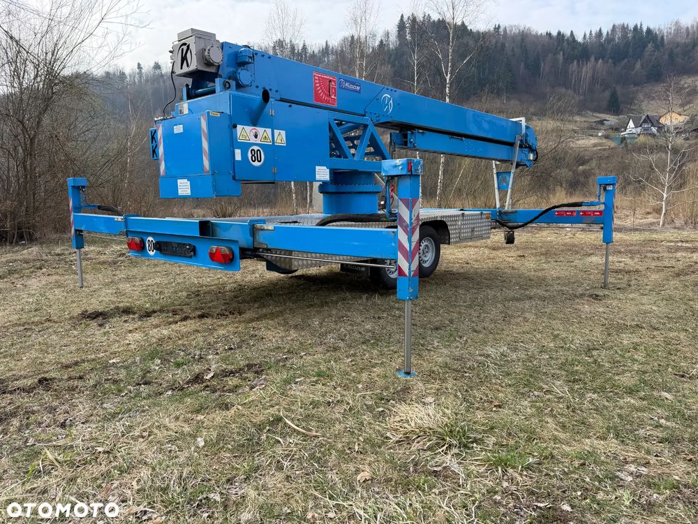 KLAAS K21/31TSR Dźwig Dekarski żuraw zwyżka podnośnik 31m. udźwig 1800kg max. Silnik Yanmar 3cyl. Kosz pojemnik. Dźwig Sterowany całkowicie zdalnie z pilota. Do 3,5 tony Transportowanie samochodem osobowym! Podwieszana oś Hydr. Własny Napęd Hydr. na 2 koła w terenie. Maszyna jak Nowa 2 tyś mtg. 2015r. Po serwisach Dekra. Sprowadzona z Norwegii. Nie różni się od nowej z salonu. Pełna Hydraulika w maszynie. Najbogatsza wersja. OKAZJA  230volt. Zero zużycia! - 3