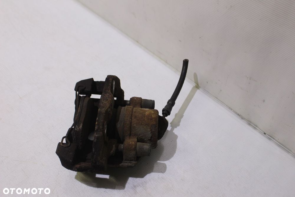 ZACISK HAMULCA LEWY PRZÓD FORD FIESTA MK6 02-08 - 4