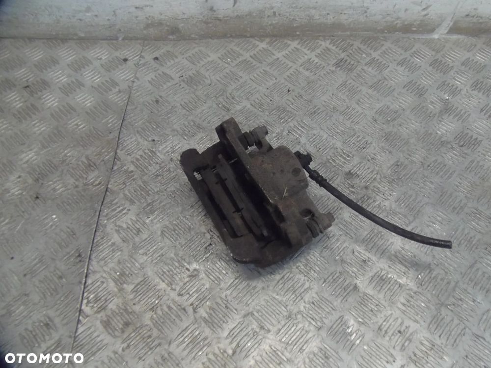 NISSAN QASHQAI J10 LIFT 1.6B 012R ZACISK HAMULCOWY PRAWY PRZEDNI PRZÓD - 2