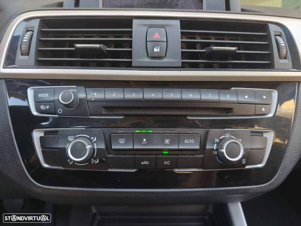 BMW 116 i Advantage — fotografia 13