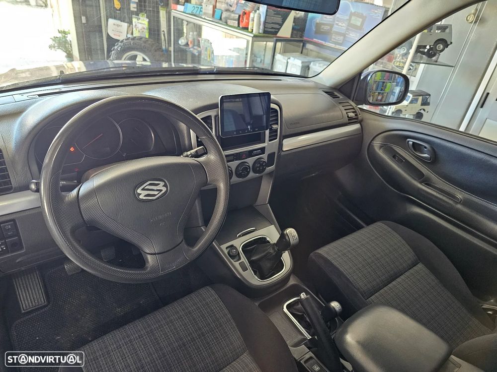 Suzuki Grand Vitara Metal Top 1.6 - 9