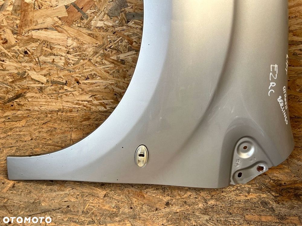 bŁotnik lewy citroen berlingo ii 2 lift kod lakieru: ezrc - 7
