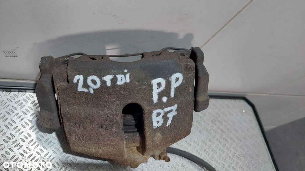 ZACISK HAMULCOWY PRAWY PRZÓD VW PASSAT B7 2,0 TDI R2013 - 2