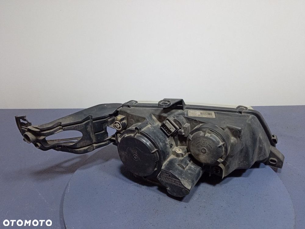 SAAB 9-5 I LIFT REFLEKTOR LEWY LAMPA PRZEDNIA EU 89006766 - 2