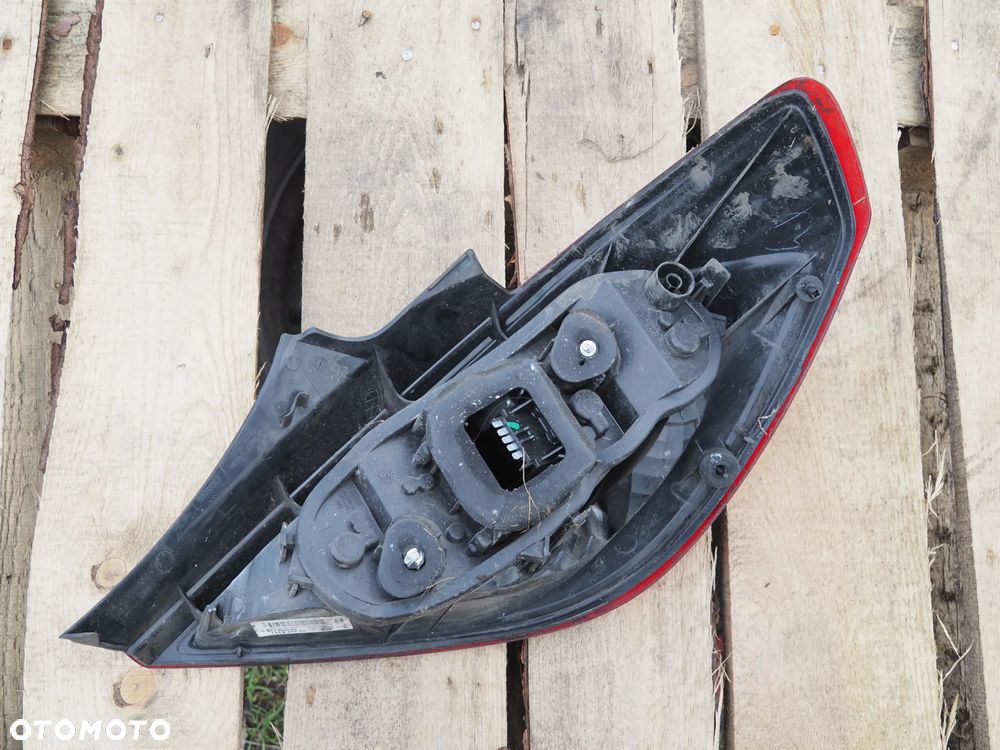 Lampa tył tylna lewa Opel Corsa D 3D 13242813 - 3