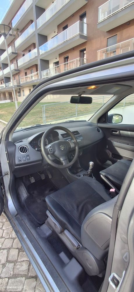 Suzuki Swift 1.3 DDiS GLX - 8