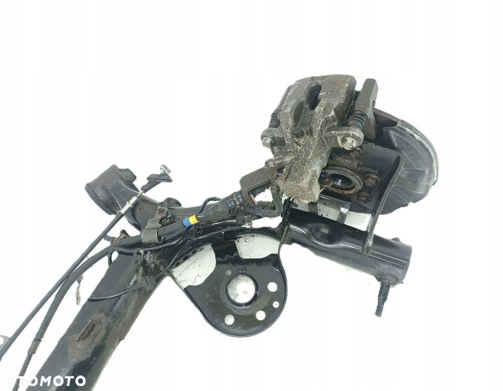BELKA OŚ TYŁ TYLNA ZAWIESZENIA TARCZE SUZUKI SWIFT MK7 10-16R 4X4 - 9