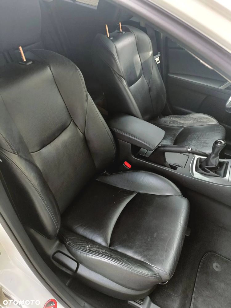 Mazda 3 2.0 Exclusive + - 12