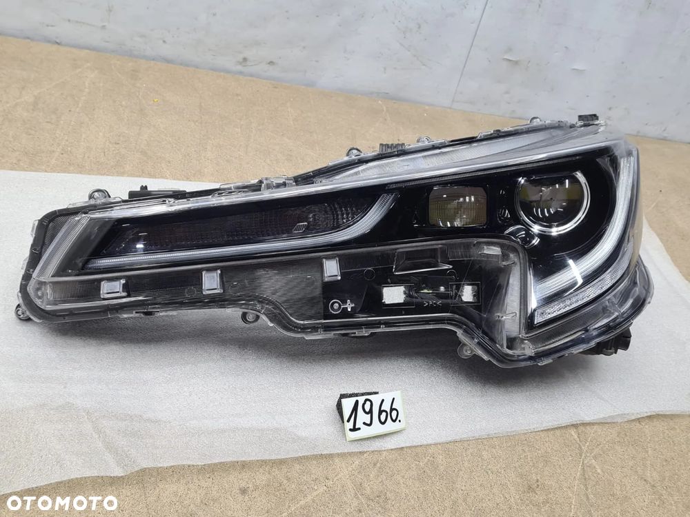 Toyota Corolla E21 kombi/HB  lampa lewy lewa  przód używana 81170-02585 - 10