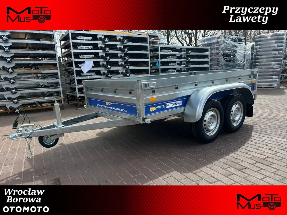 Inny Przyczepa VESTA LIGHT TANDEM 25DA 251x135x37 cm 2 osie DMC 750 kg WYSOKIE BURTY spawana rama Wrocław MOTOMUS