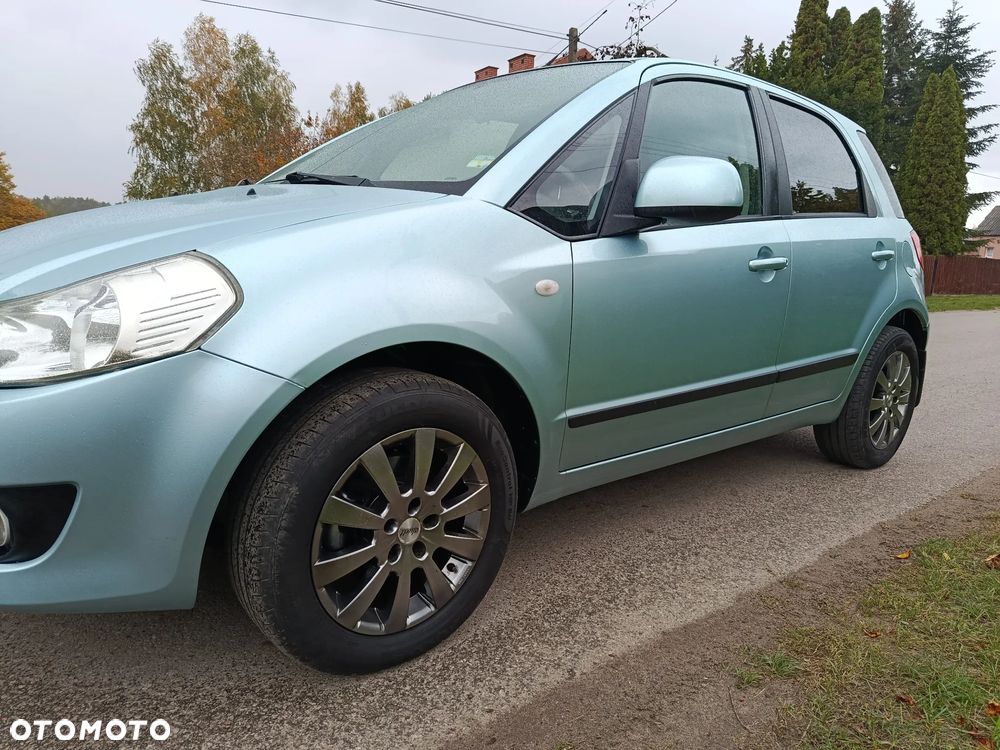 Suzuki SX4 1.6 GLX / Comfort - 14