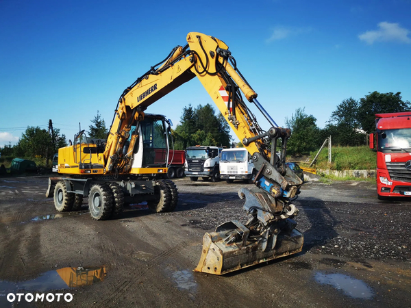 Liebherr 900 rototilt głowica obrotowa pług
