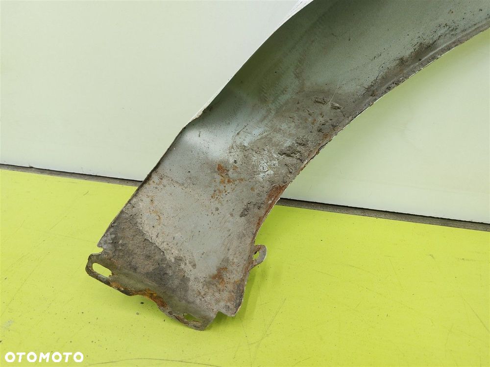 Błotnik przedni lewy OPEL CORSA D 2006-2014 10U / Z474 BIAŁY - 8