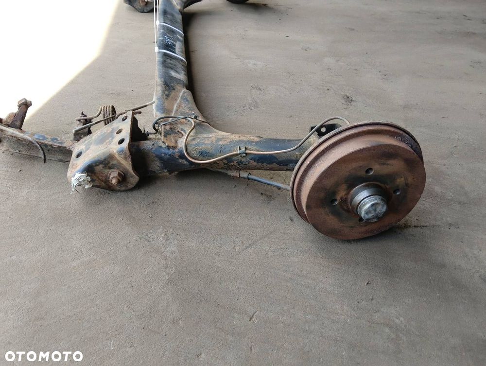 BELKA OŚ ZAWIESZENIA TYŁ BĘBNY BEZ ABS VOLKSWAGEN GOLF II HB 5D - 4