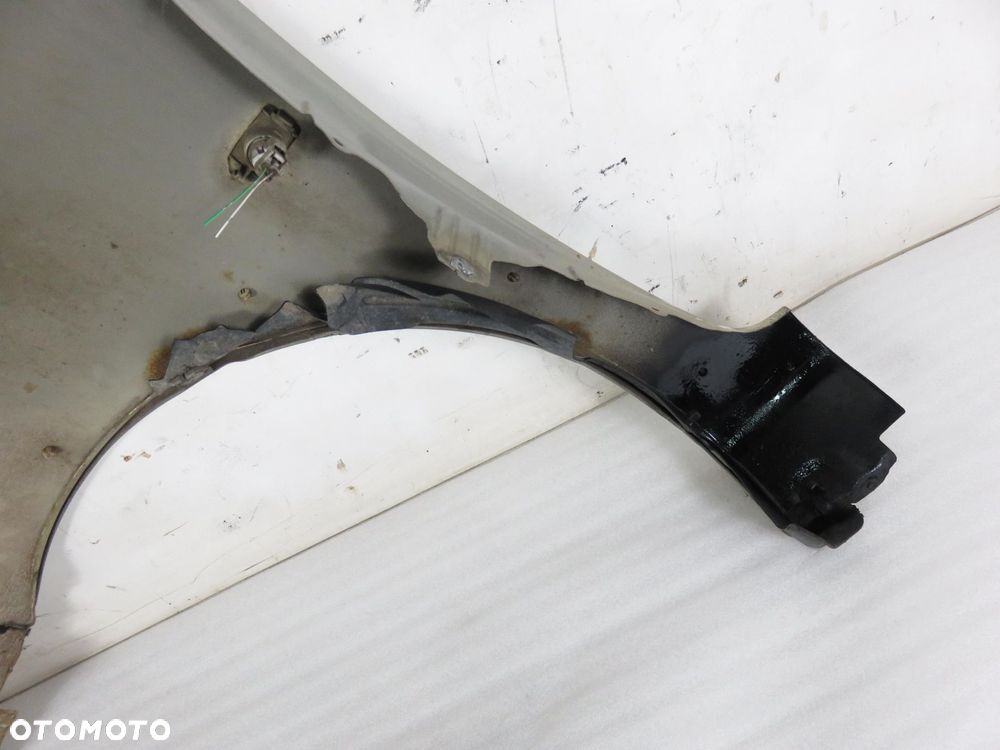 BŁOTNIK PRAWY PRZEDNI TOYOTA YARIS VERSO 583 - 2