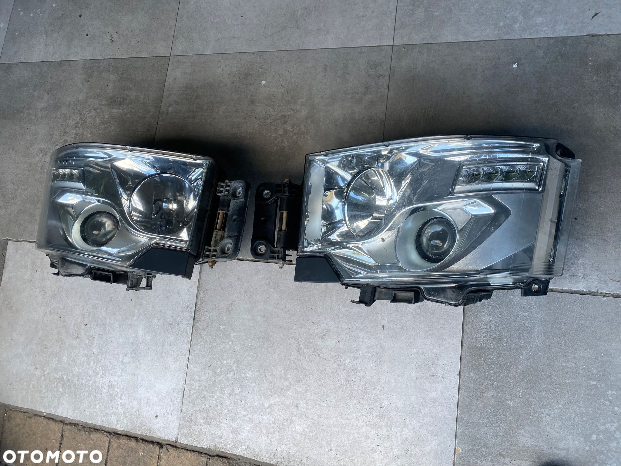 RENAULT GAMA T RANGE LAMPA LEWA/PR  89207611 ORG - 1