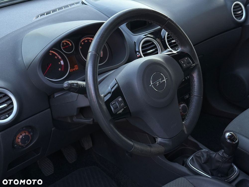 Opel Corsa 1.2 16V Cosmo - 8