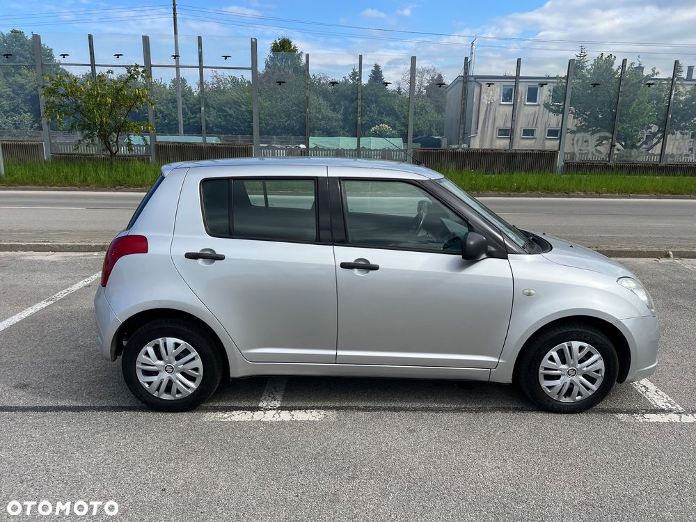 Suzuki Swift 1.3 Club - 12