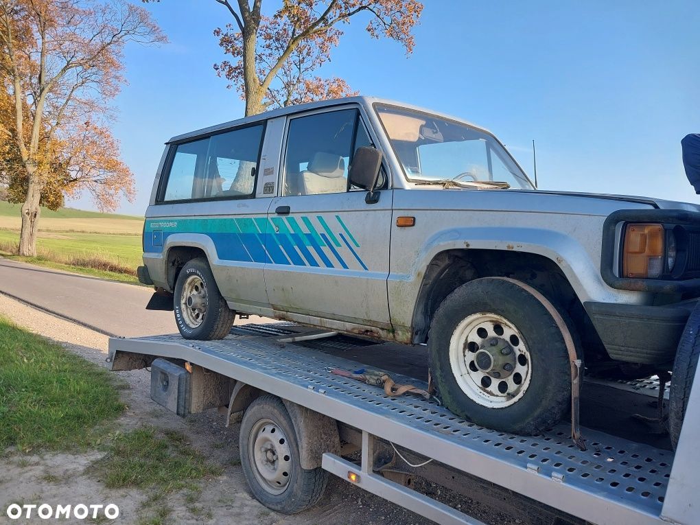 Isuzu trooper I 2.3 benzyna na części silnik skrzynia drzwi most - 1
