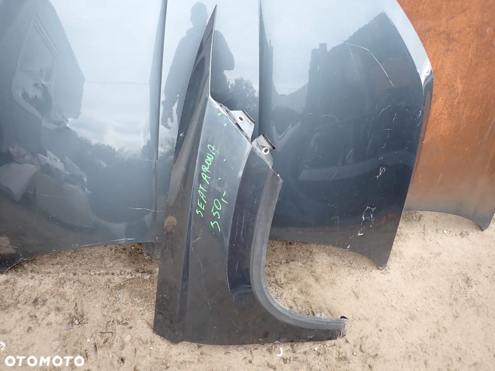 SEAT ARONA BŁOTNIK PRAWY PRZÓD