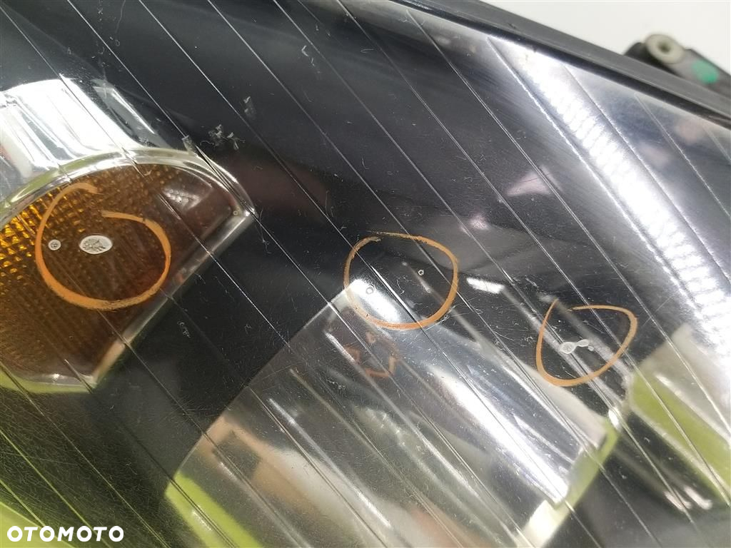 Reflektor lampa przód prawa Opel Astra III H 2004-2013 HELLA  1EG27037002 - 9