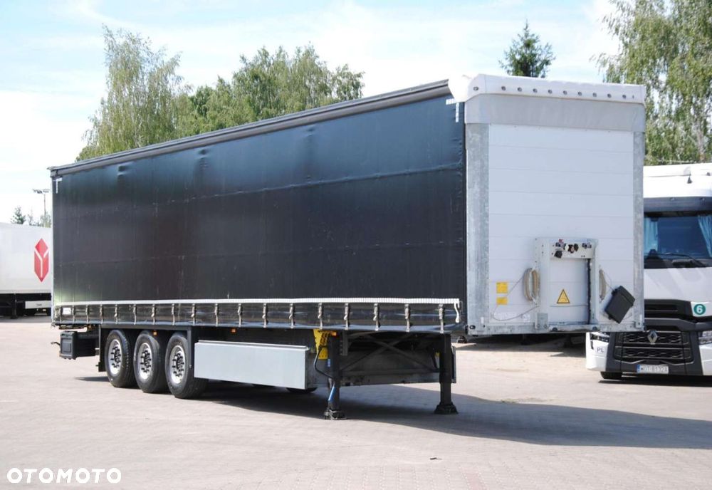 Schmitz Cargobull SCS kurtyna, podnoszona oś - 2