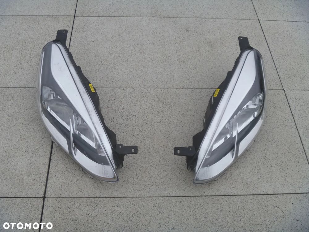 FORD FIESTA MK8 BŁOTNIK PRAWY LEWY ORYGINAŁ - 12