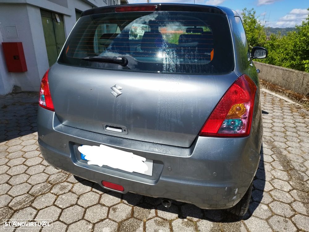 Suzuki Swift 1.3 DDiS GLX - 7